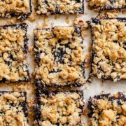 squares of berry crumble bars made with fresh summer berries.