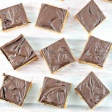 No Bake Peanut Butter Bars: Five ingredients and ten minutes are all you need for this crowd-pleasing favorite! #bunsenburnerbakery #peanutbutterbars #nobake #peanutbutter #chocolate