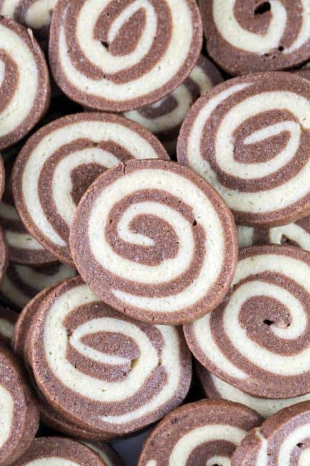 closeup photo of chocolate and vanilla swirled pinwheel cookies