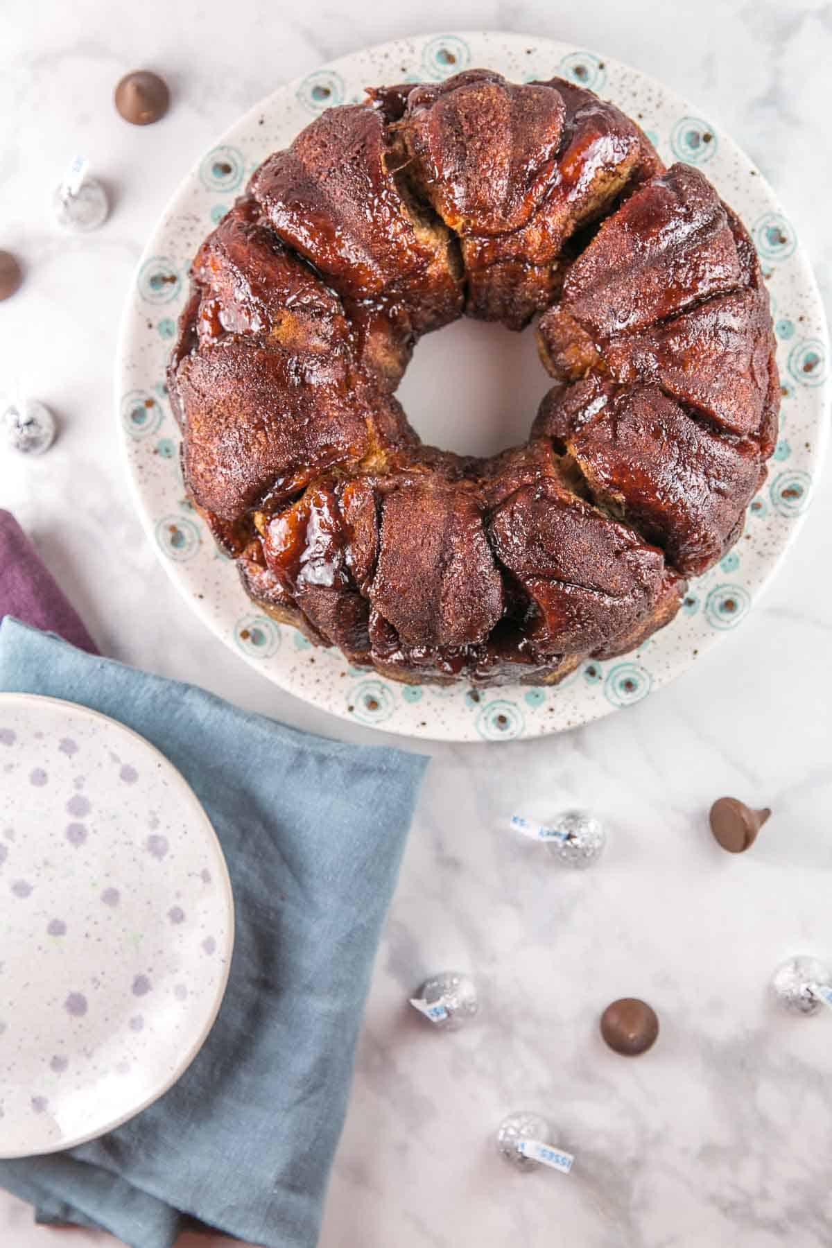 a chocolate bubble ring on a blue decorative plate.