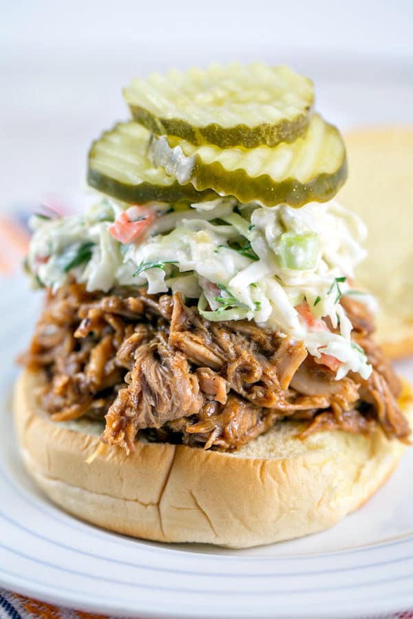 Crockpot BBQ Pulled Pork Sliders with Horseradish Dill Coleslaw: perfect for parties and football games! {Bunsen Burner Bakery} #pulledpork #slowcooker #gameday