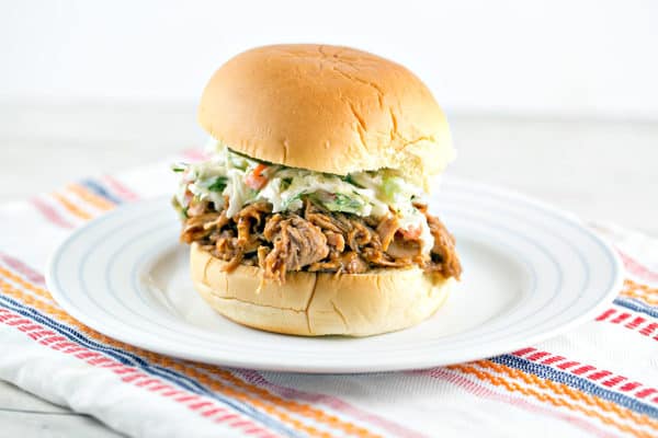 Crockpot BBQ Pulled Pork Sliders with Horseradish Dill Coleslaw: perfect for parties and football games! {Bunsen Burner Bakery} #pulledpork #slowcooker #gameday