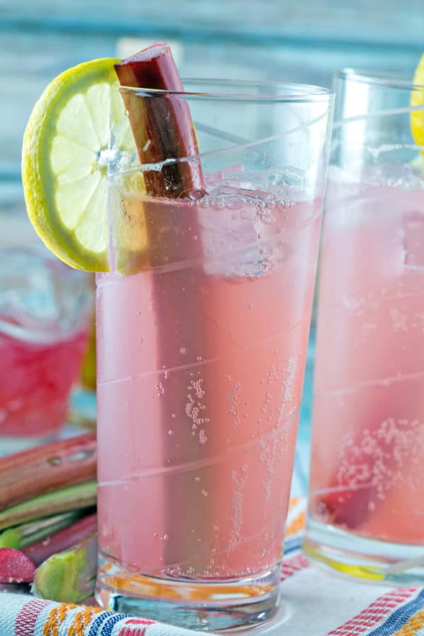 Rhubarb Tom Collins: a delightfully pink twist on a Tom Collins, this simple Rhubarb Tom Collins requires only four ingredients and is perfect to sip all spring and summer long. {Bunsen Burner Bakery} #rhubarb #cocktails #tomcollins #drinks