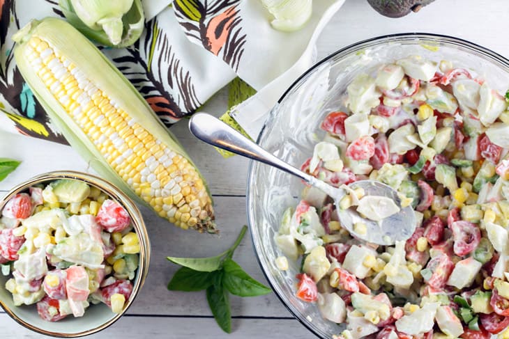 Corn and Tomato Crab Salad: filled with fresh summer corn, tomatoes, and avocado, this crab salad is a great alternative to standard picnic and BBQ sides. {Bunsen Burner Bakery} #crab #corn #tomatoes #picnic #sides #summer