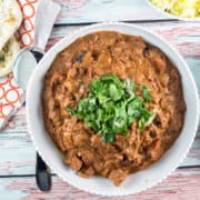 Chicken Tikka Masala: Warm up from the cold with this easy, flavorful chicken tikka masala, adaptable for either the stovetop or crockpot. #bunsenburnerbakery #chickentikkamasala #slowcooker #homemadeindian #glutenfree