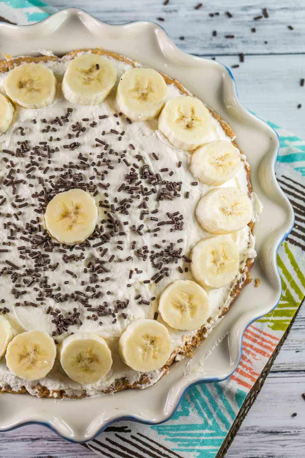 Old Fashioned Banana Cream Pie: A traditional, homemade diner-style pie - banana-infused pastry cream, sliced fresh bananas, and sky-high whipped cream. {bunseburnerbakery.com} #pie #bananacreampie