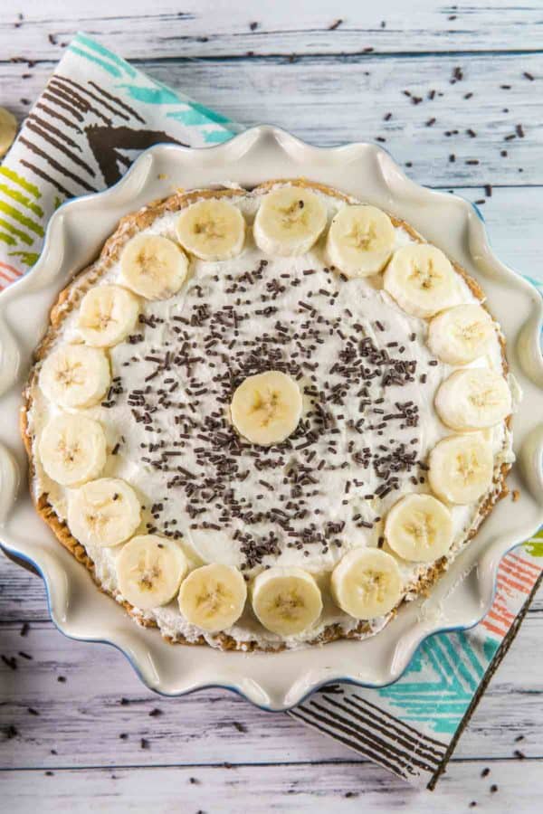 Old Fashioned Banana Cream Pie: A traditional, homemade diner-style pie - banana-infused pastry cream, sliced fresh bananas, and sky-high whipped cream. {bunseburnerbakery.com} #pie #bananacreampie