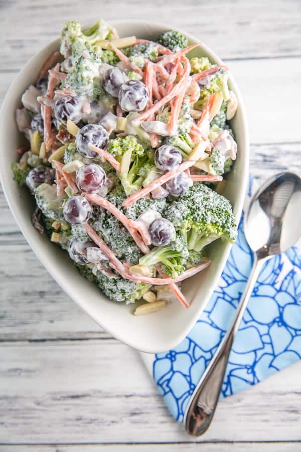 Extra Crunchy Broccoli Salad: easy summer picnic broccoli salad with almonds, bacon, and grapes. Packed full of flavor without all the guilt - no mayo necessary. {bunsenburnerbakery.com} #salad #broccolisalad #picnic