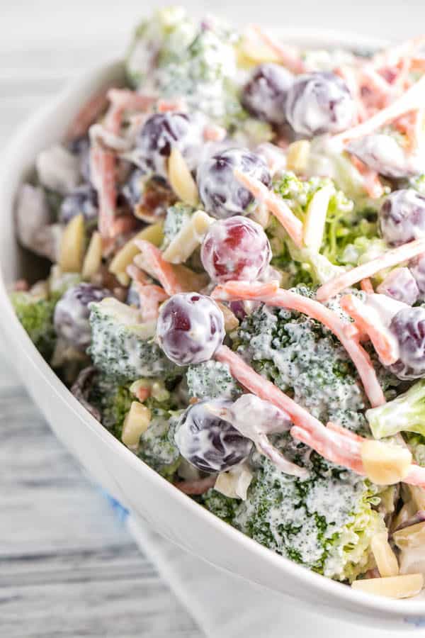 Extra Crunchy Broccoli Salad: easy summer picnic broccoli salad with almonds, bacon, and grapes. Packed full of flavor without all the guilt - no mayo necessary. {bunsenburnerbakery.com} #salad #broccolisalad #picnic