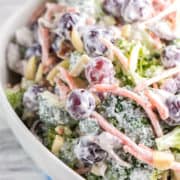 Extra Crunchy Broccoli Salad: easy summer picnic broccoli salad with almonds, bacon, and grapes. Packed full of flavor without all the guilt - no mayo necessary. {bunsenburnerbakery.com} #salad #broccolisalad #picnic