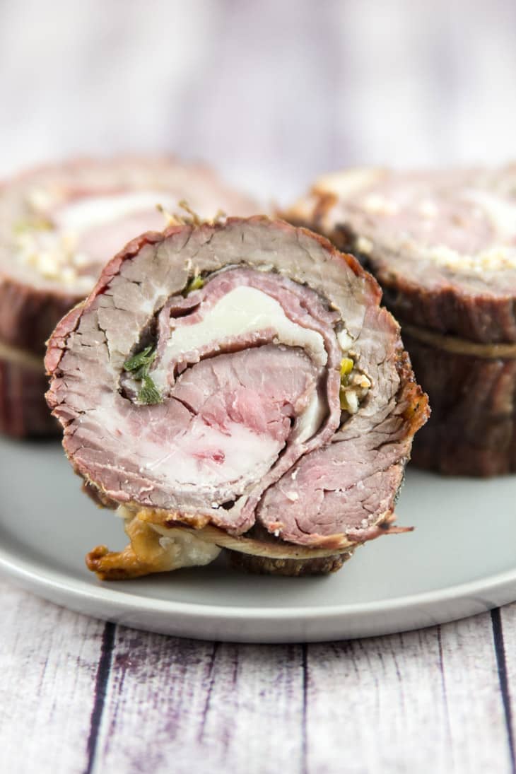 Italian Flank Steak Pinwheels: flank steak stuffed with salami and provolone, rolled tightly, and grilled. Go ahead, impress your friends - they don't have to know how easy this is. {Bunsen Burner Bakery}