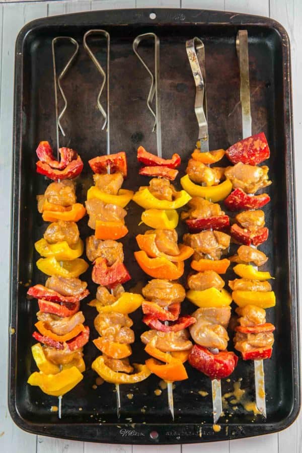 chicken and veggies on skewers ready to grill