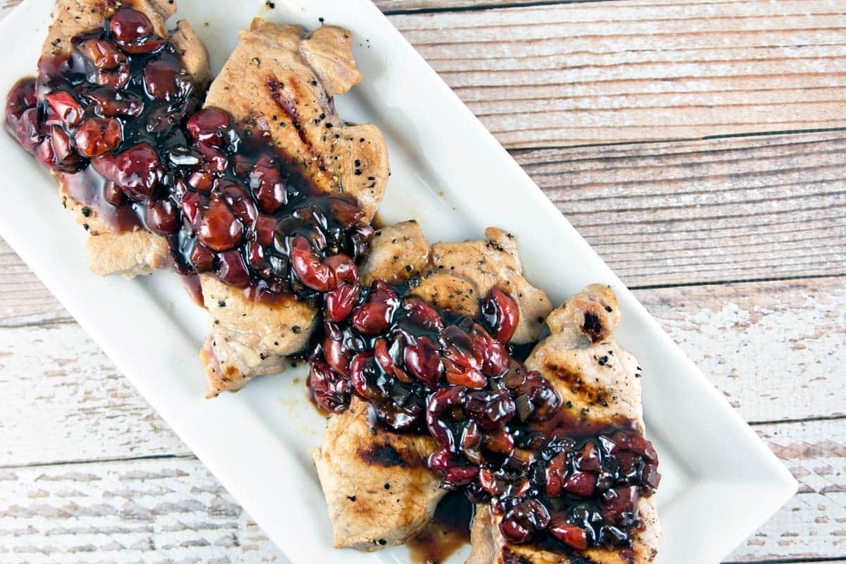 Pan-Grilled Pork Chops with Sour Cherry Sauce: perfectly brined pork chops with a delicious sweet and sour sauce. {Bunsen Burner Bakery}