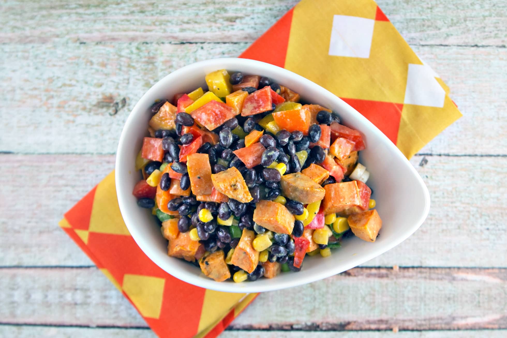 Sweet Potato Black Bean Salad: the best salad of summer. Buttery sweet potatoes, crunchy peppers, tangy mustard-lime dressing. {Bunsen Burner Bakery}