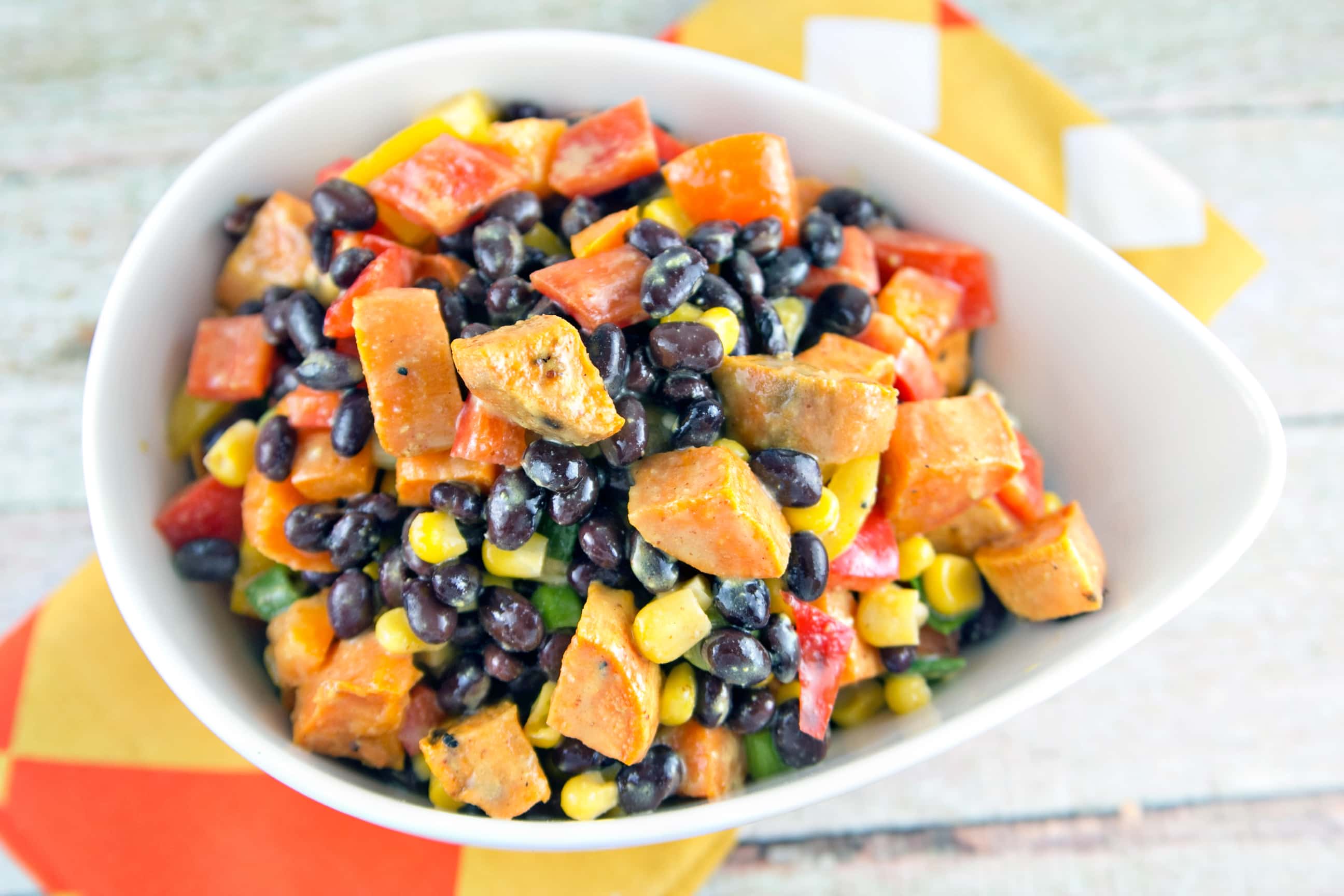 Sweet Potato Black Bean Salad: the best salad of summer. Buttery sweet potatoes, crunchy peppers, tangy mustard-lime dressing. {Bunsen Burner Bakery}