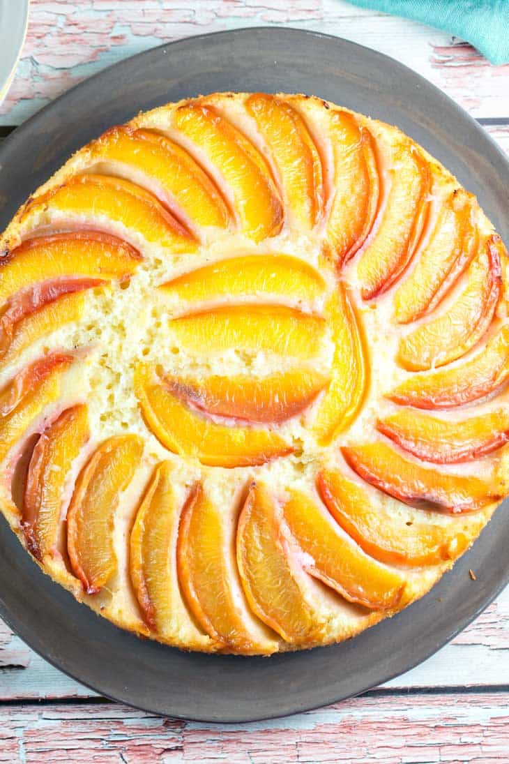 upside down coffee cake covered with slices of nectarines
