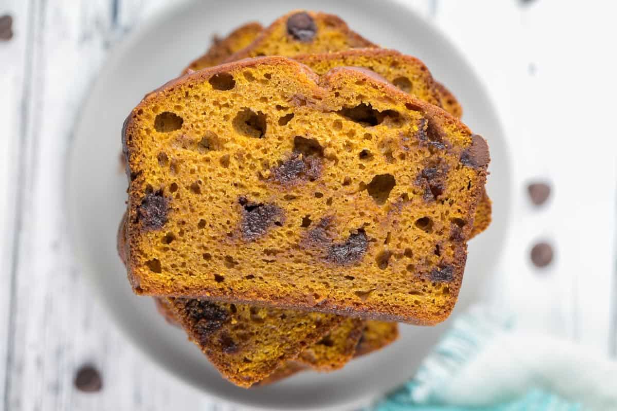 overhead picture of stacked slices of chocolate chip pumpkin bread.