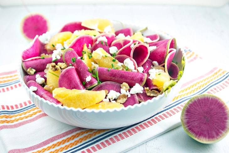 Watermelon Radish and Citrus Salad: thinly sliced watermelon radishes paired with winter citrus, candied walnuts, and tangy goat cheese make a beautiful spring salad. {Bunsen Burner Bakery}