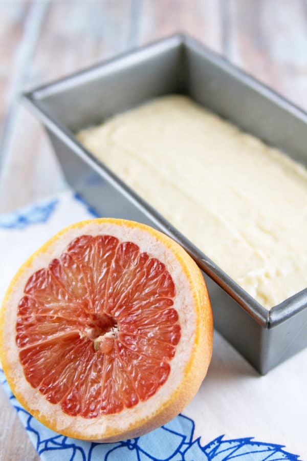 Candied Grapefruit Quick Bread: Yogurt quick bread loaded with grapefruit juice and zest, then topped with sugary grapefruit glaze and candied grapefruit. The ultimate grapefruit bread! {Bunsen Burner Bakery}