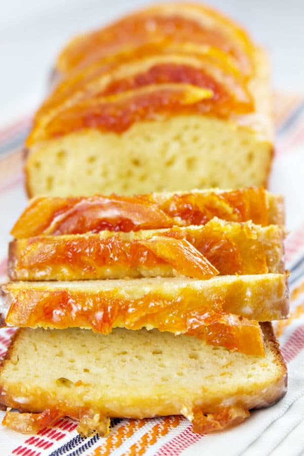 Candied Grapefruit Quick Bread: Yogurt quick bread loaded with grapefruit juice and zest, then topped with sugary grapefruit glaze and candied grapefruit. The ultimate grapefruit bread! {Bunsen Burner Bakery}