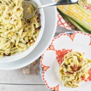 bowl of pasta covered with homemade corn pesto