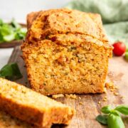 loaf of savory quick bread made with fresh tomatoes and herbs