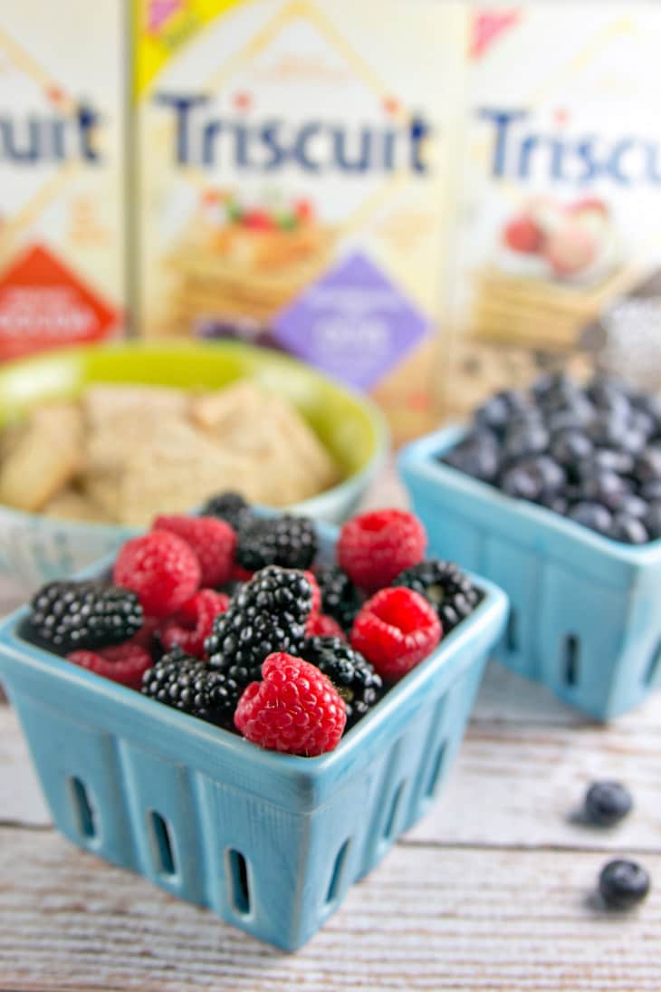 TriBerryTriscuits (Triple Berry Herb Cracker Bites): The perfect summer entertaining appetizer bites -- easy homemade berry compote paired with fresh herbs, TRISCUIT crackers, and a dollop of honey goat cheese. {Bunsen Burner Bakery}