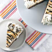 Brownie Bottom Peanut Butter Ice Cream Pie: Why choose between brownies and ice cream when you can make one show-stopping dessert with both? Grab a fork (or spoon) and dig on in! #bunsenburnerbakery #icecream #brownies #icecreampie #icecreamcake