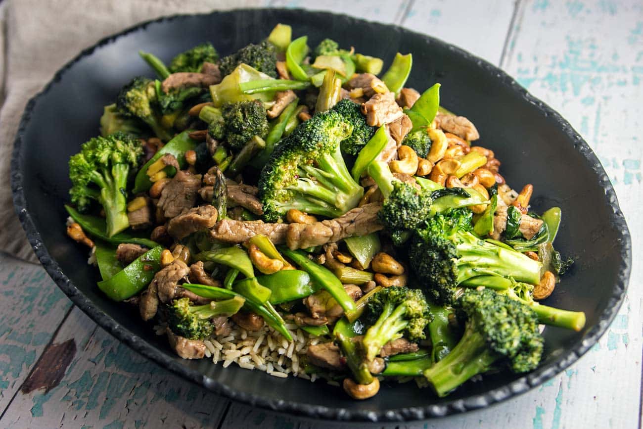 Pork Stir Fry with Cashews: fresh vegetables, crunchy cashews, and marinated pork tenderloin. A delicious, vegetable-heavy dinner, on your table in under 30 minutes. {Bunsen Burner Bakery}