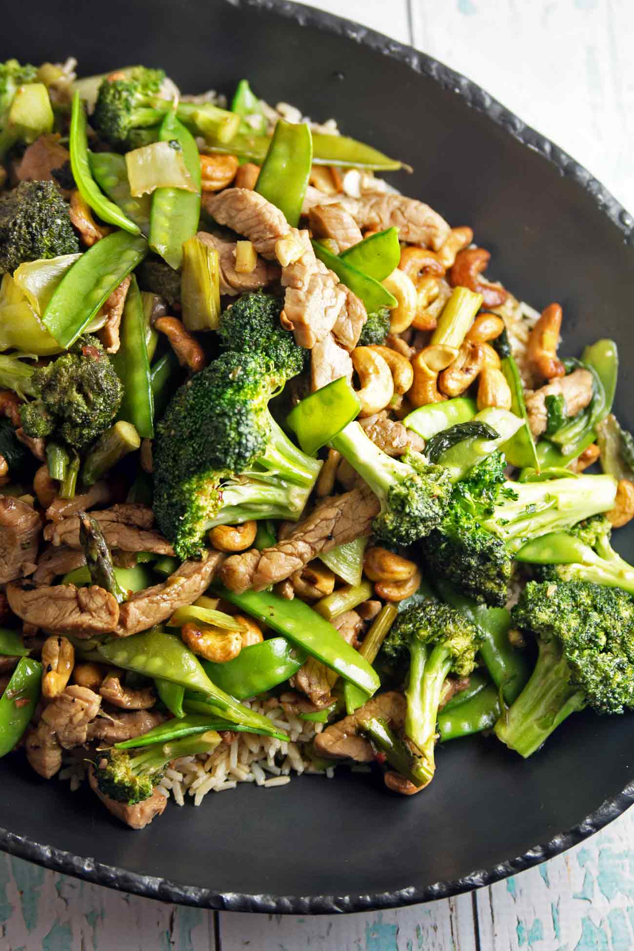 Pork Stir Fry with Cashews: fresh vegetables, crunchy cashews, and marinated pork tenderloin. A delicious, vegetable-heavy dinner, on your table in under 30 minutes. {Bunsen Burner Bakery}