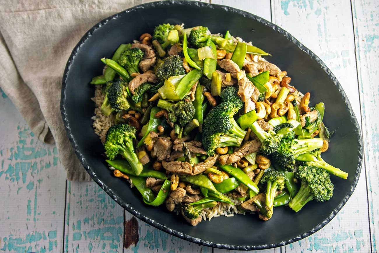 Pork Stir Fry with Cashews: fresh vegetables, crunchy cashews, and marinated pork tenderloin. A delicious, vegetable-heavy dinner, on your table in under 30 minutes. {Bunsen Burner Bakery}