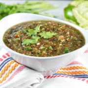 Roasted Tomato Salsa Verde: fire roasted tomatillos and cherry tomatoes pair beautifully with spicy jalapeno, onion, and garlic in this non-traditional salsa verde. A little sweet, a little tangy, a little spicy - all delicious. {Bunsen Burner Bakery}