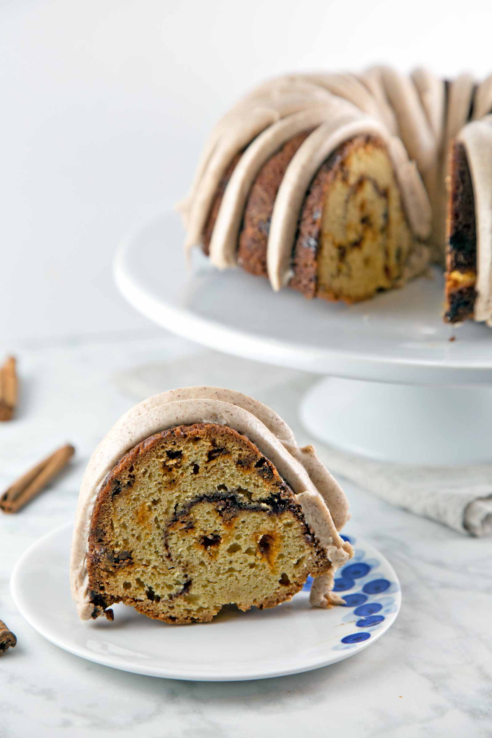 Cinnamon Swirl Bundt Cake: one bowl, whisk by hand, with cinnamon cream cheese frosting. Plus tips for the BEST cake from a boxed cake mix! {Bunsen Burner Bakery}