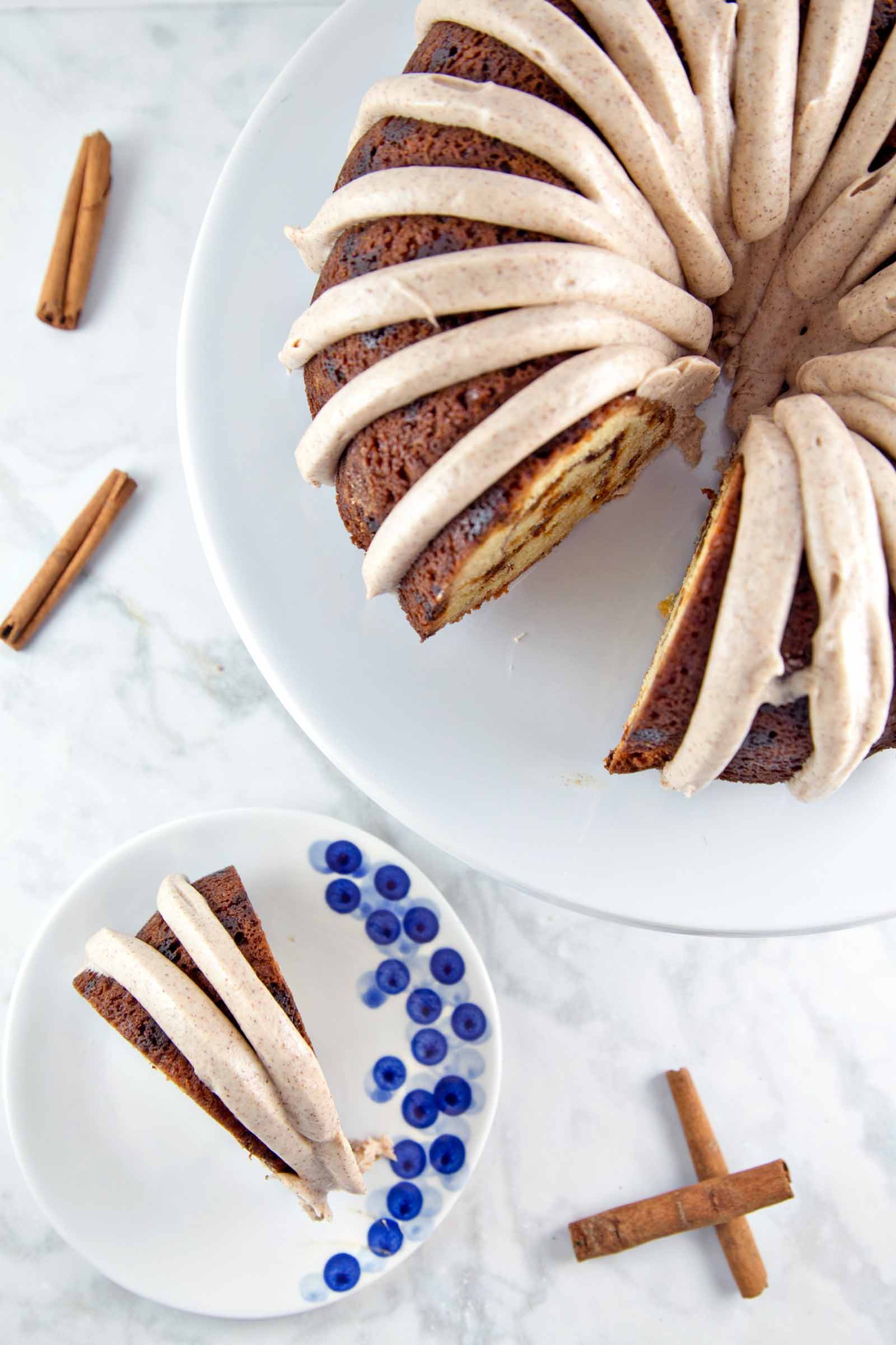 Cinnamon Swirl Bundt Cake: one bowl, whisk by hand, with cinnamon cream cheese frosting. Plus tips for the BEST cake from a boxed cake mix! {Bunsen Burner Bakery}