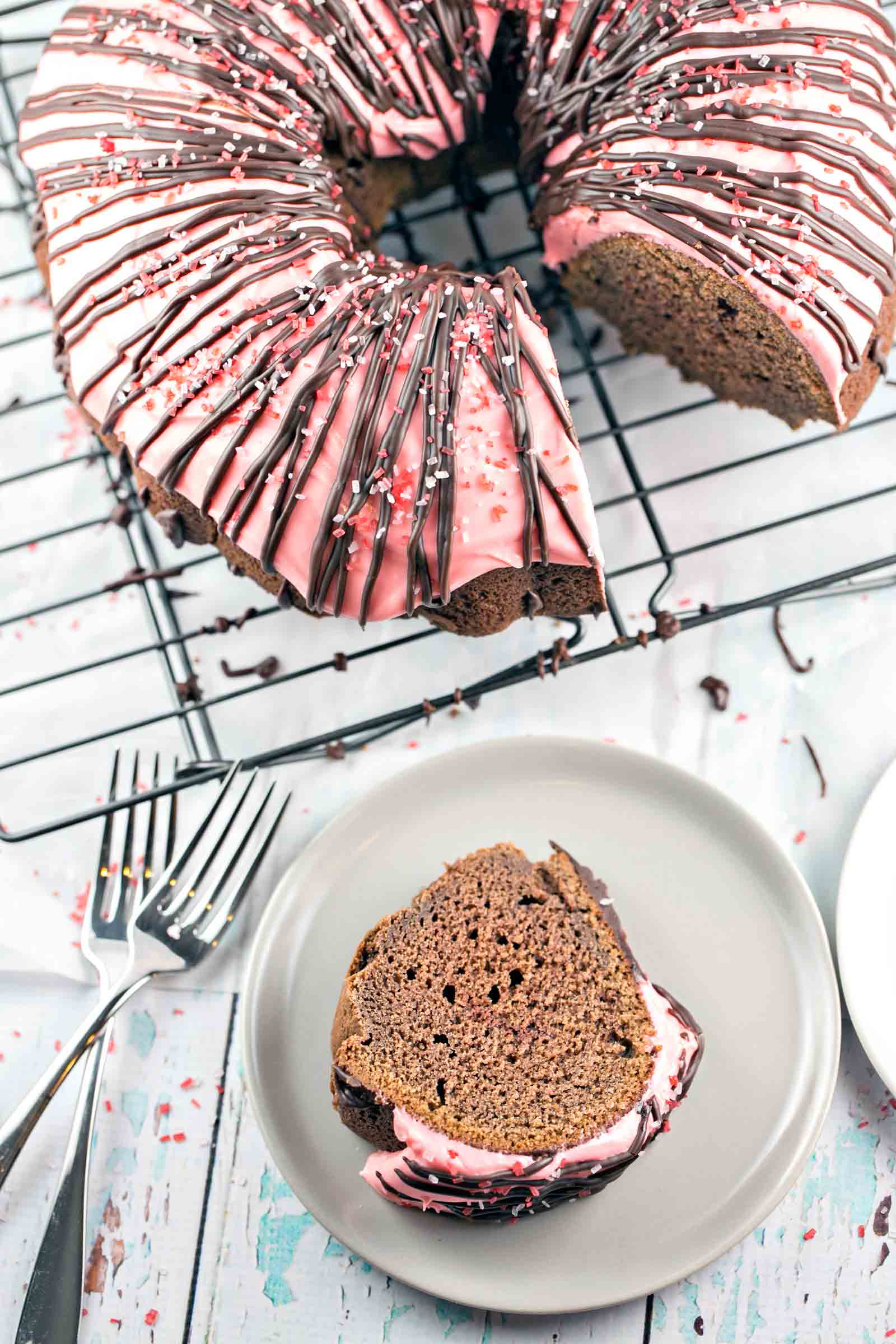 Peppermint Mocha Bundt Cake: rich chocolate cake, peppermint cream cheese frosting, and a chocolate ganache drizzle - this one-bowl mix by hand bunt cake is perfect for holiday entertaining. {Bunsen Burner Bakery}
