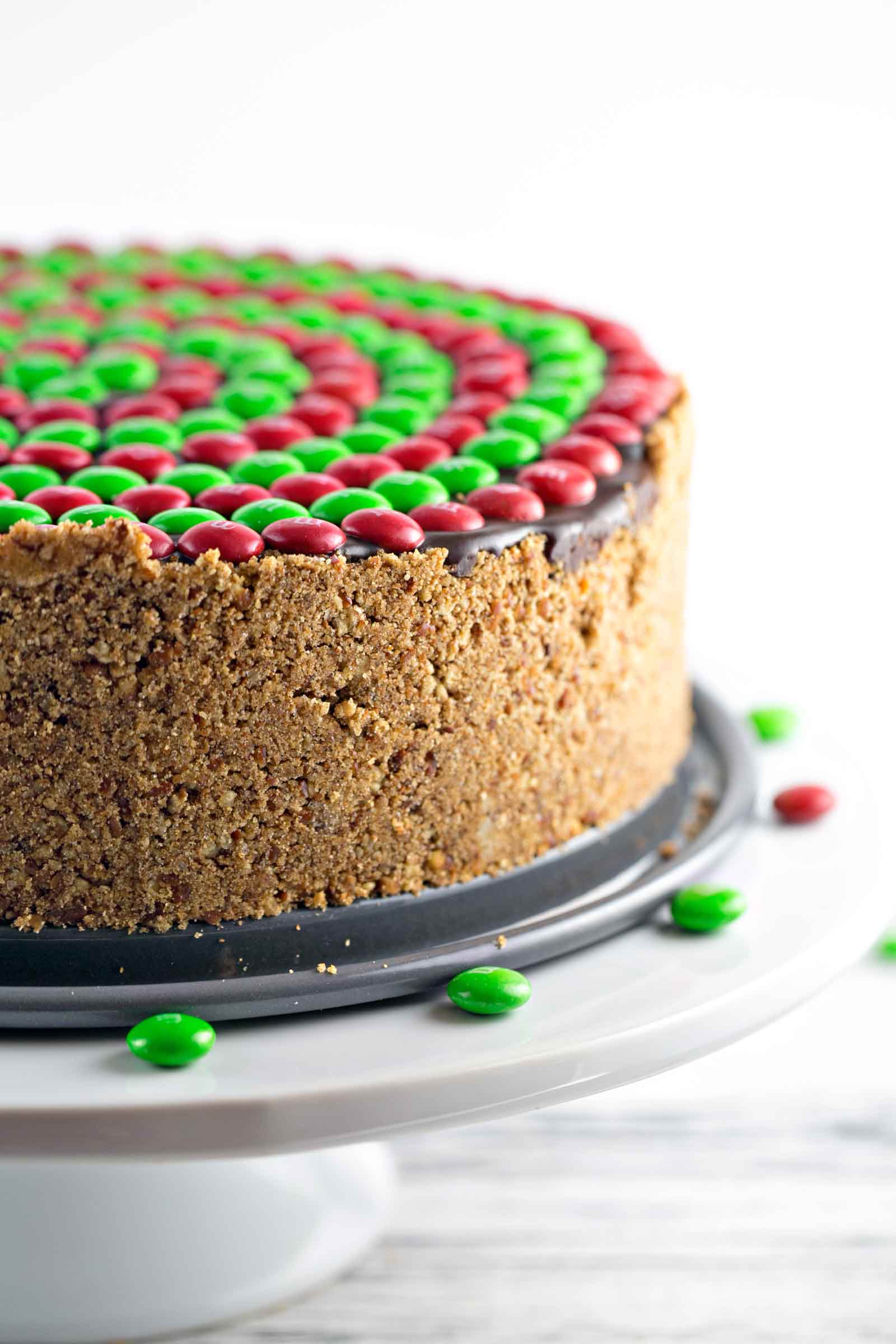 No Bake M&M’S® Pretzel Peanut Butter Pie: salty, crispy pretzel crust, smooth whipped peanut butter filling, rich chocolate ganache, and crunchy M&Ms combine into the perfect easy pie. Perfect for holiday entertaining! {Bunsen Burner Bakery}