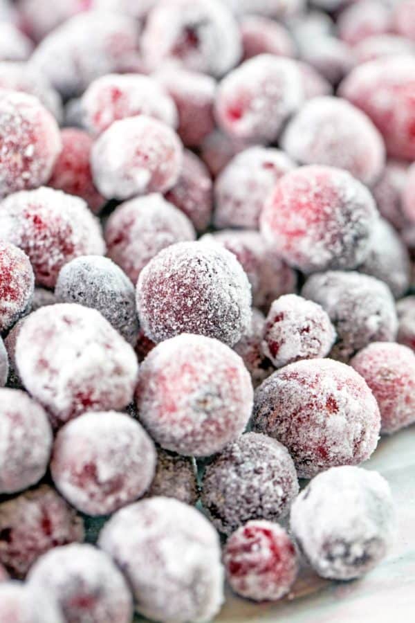 closeup picture of a pile of sugared cranberries.