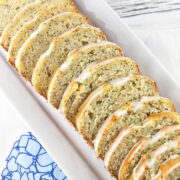 slices of lemon poppy seed bread on a white plate