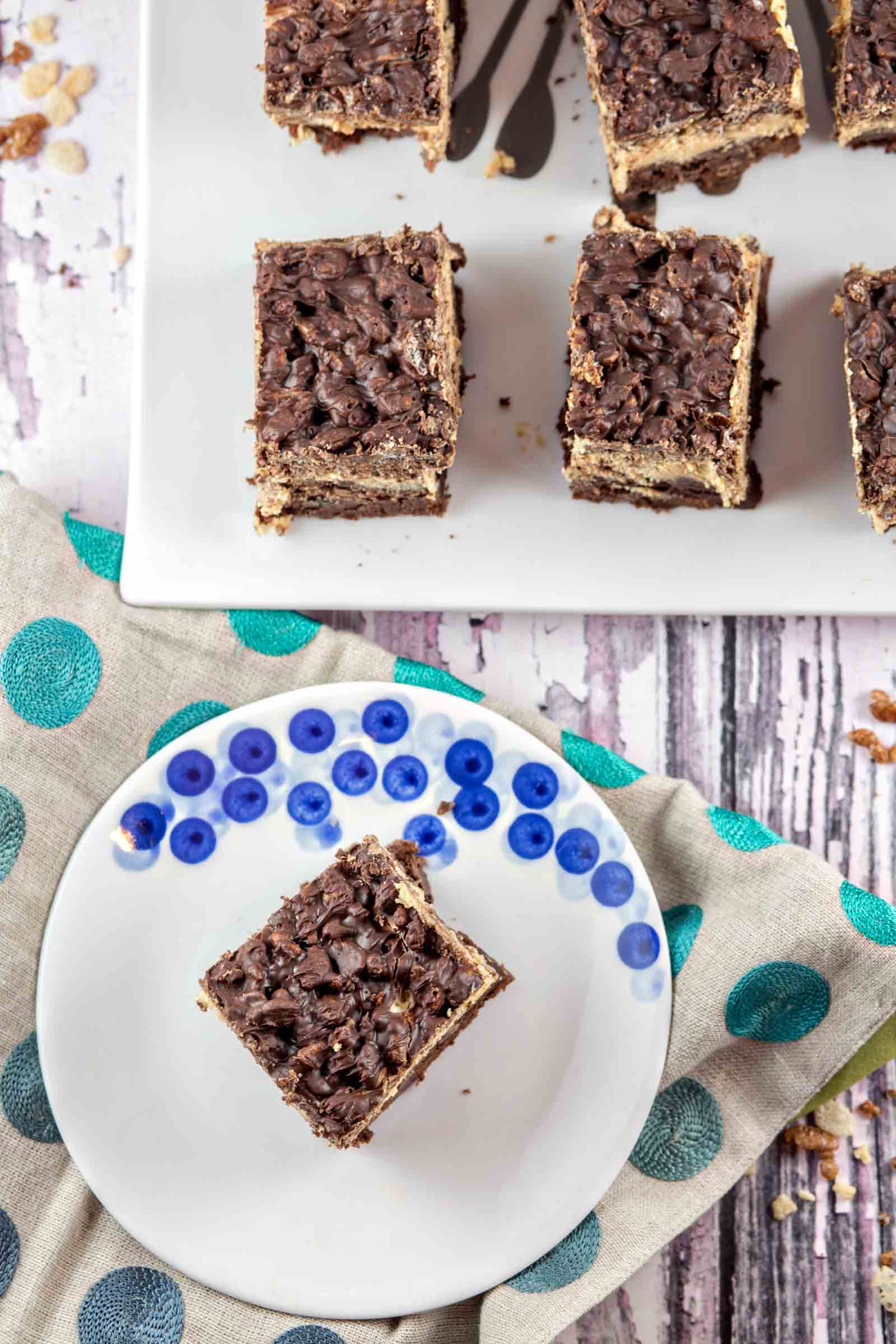 Peanut Butter Crunch Brownies: homemade brownies, peanut butter ganache frosting, and a Rice Krispie chocolate crunch layer - the perfect make-ahead party treat! {Bunsen Burner Bakery}