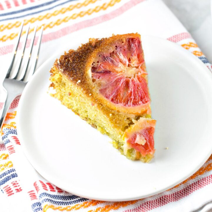 single slice of olive oil cake with blood oranges baked on top