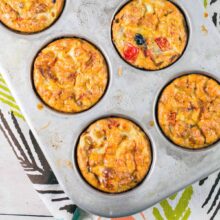 protein packed baked egg muffins with southwestern flavors in a muffin tin