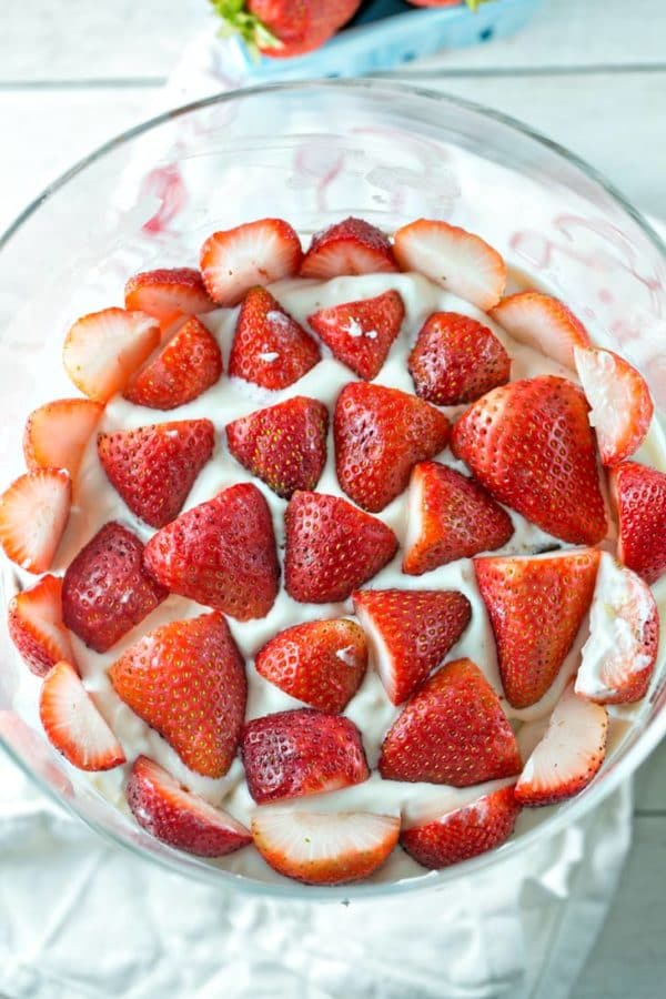 Chocolate Chip Strawberry Trifle: chocolate chip pound cake, hot fudge frosting, homemade pudding, and fresh strawberries make THE BEST strawberry trifle. This is summer dessert perfection! {Bunsen Burner Bakery}