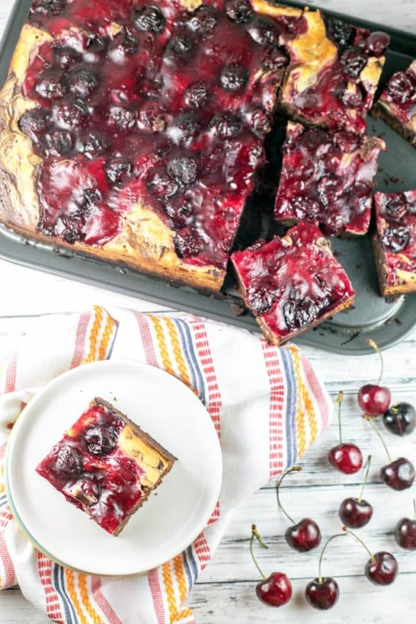 Cherry Cheesecake Brownies: made entirely from scratch with thick, fudgy brownies, a creamy layer of cheesecake batter, and homemade cherry pie filling on top. {Bunsen Burner Bakery}