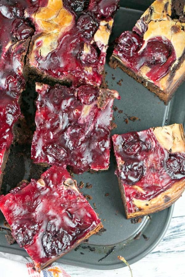 Cherry Cheesecake Brownies: made entirely from scratch with thick, fudgy brownies, a creamy layer of cheesecake batter, and homemade cherry pie filling on top. {Bunsen Burner Bakery}