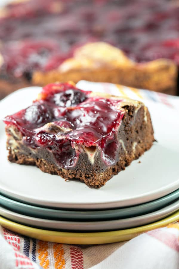 Cherry Cheesecake Brownies: made entirely from scratch with thick, fudgy brownies, a creamy layer of cheesecake batter, and homemade cherry pie filling on top. {Bunsen Burner Bakery}
