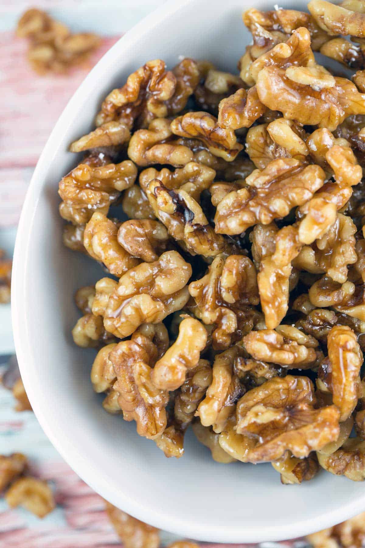 closeup picture of candied maple glazed walnuts.