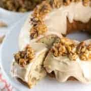 Maple Walnut Bundt Cake: vanilla bundt cake filled with maple and walnut, a thick layer of maple frosting, topped with homemade maple glazed walnut. It's the perfect fall cake! #bunsenburnerbakery #bundtcake #cake #maplewalnut #fallbaking