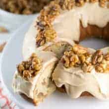 Maple Walnut Bundt Cake: vanilla bundt cake filled with maple and walnut, a thick layer of maple frosting, topped with homemade maple glazed walnut. It's the perfect fall cake! #bunsenburnerbakery #bundtcake #cake #maplewalnut #fallbaking