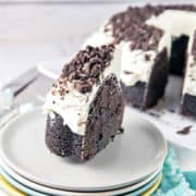 Cookies and Cream Oreo Bundt Cake: the ultimate deep, dark, rich chocolate cake, full of chopped oreos and covered in marshmallow butter cream frosting. {Bunsen Burner Bakery} #cake #bundtcake #oreos #cookiesandcream