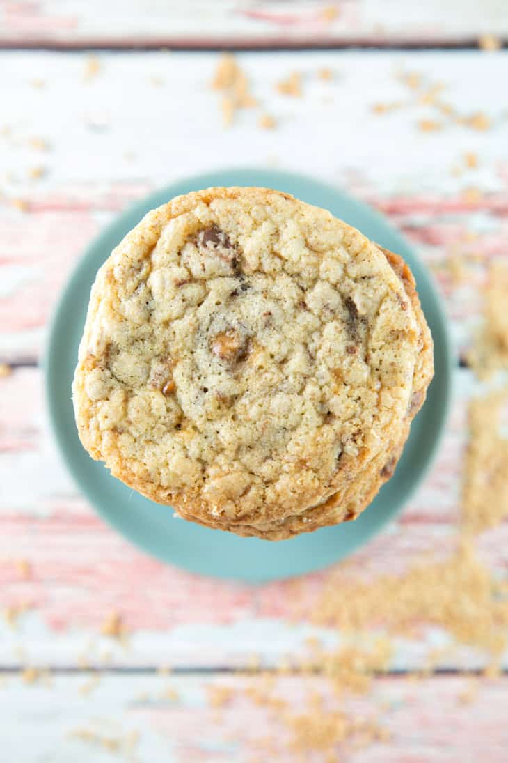 overhead view of a tall stack of buttery cookies filled with toffee bits.